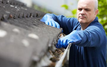 cleaning and inspecting Cross Street roofs